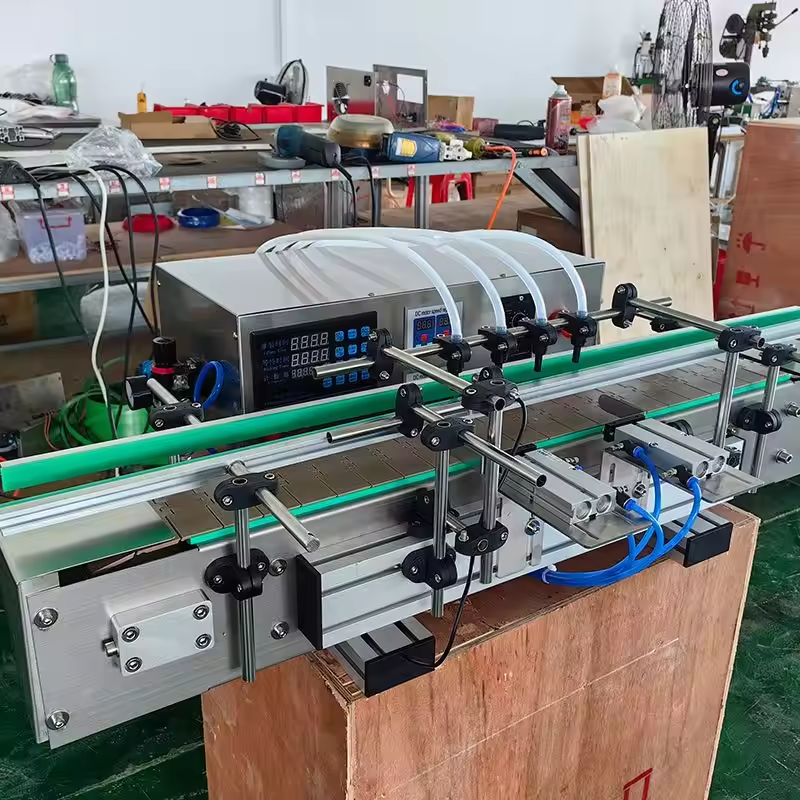 Wholesale Automatic Desktop Liquid Wine Whisky Filling Machine Glass Plastic Bottle Filling Machine With Conveyor Belt